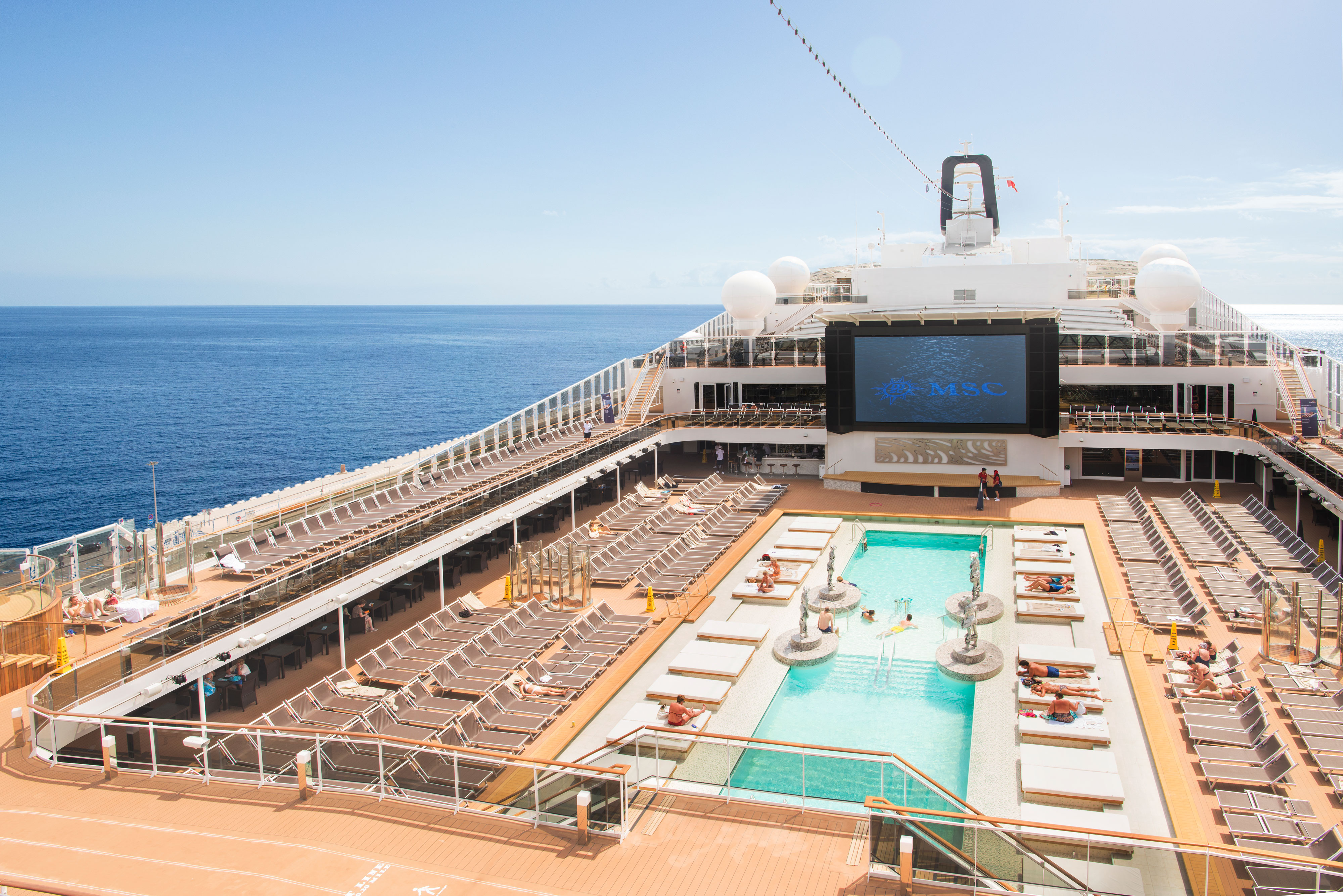 The pool deck where films screen under starry skies