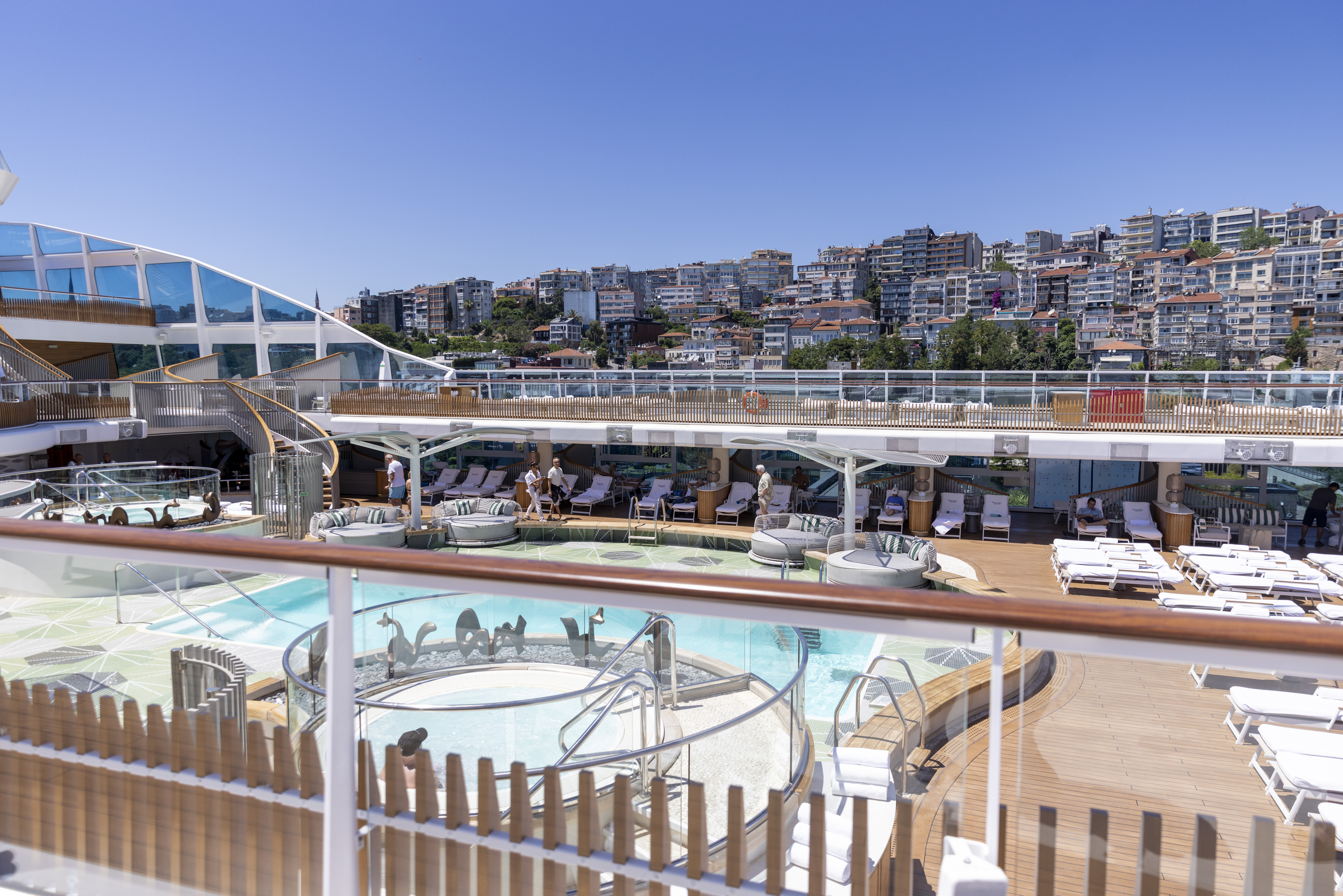 Oceania Vista’s Pool Deck reflects the beauty of the surrounding sea.