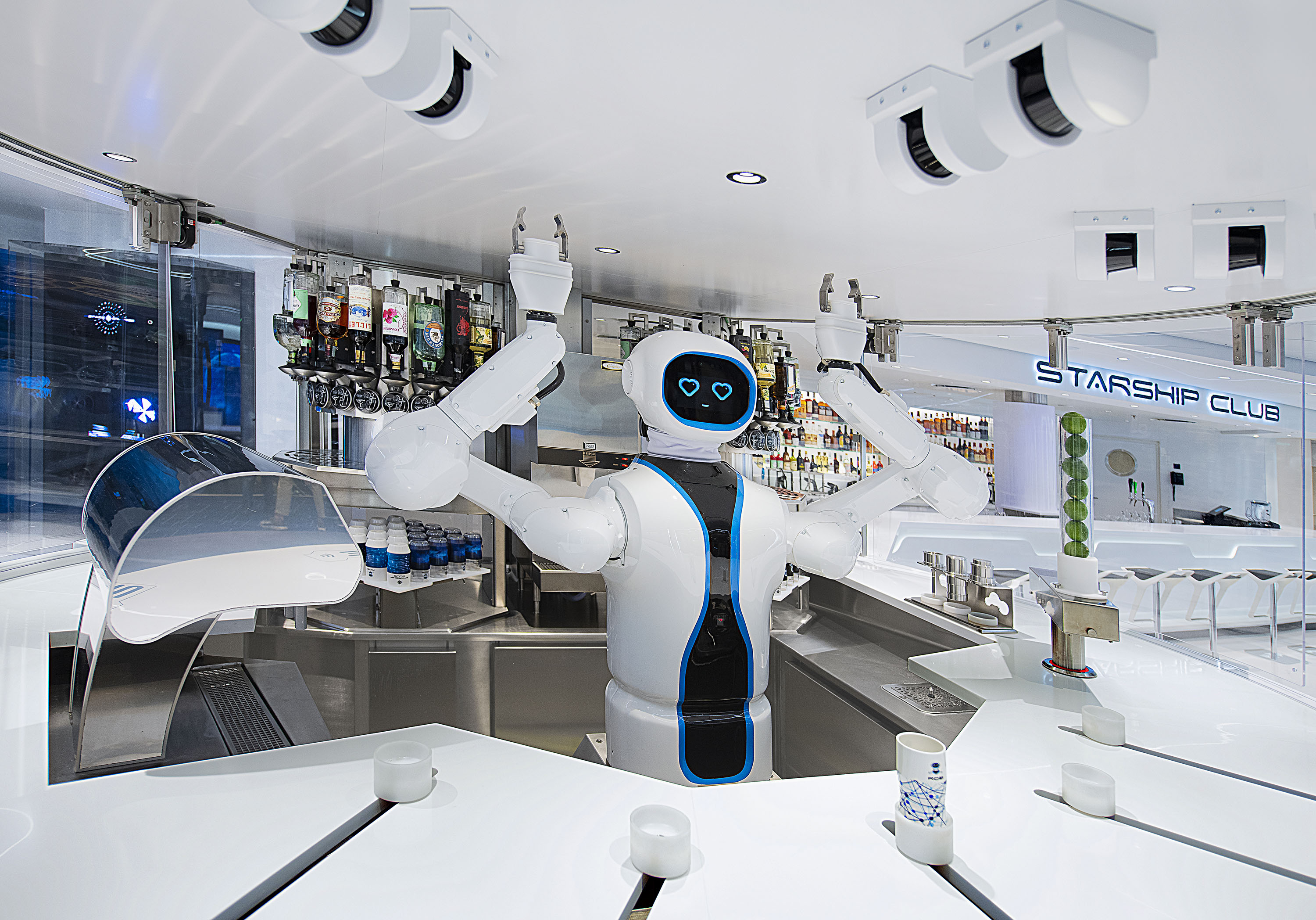 Enjoy five outdoor bars  and 16 indoor bars, including the first humanoid Robotic bartender at sea!