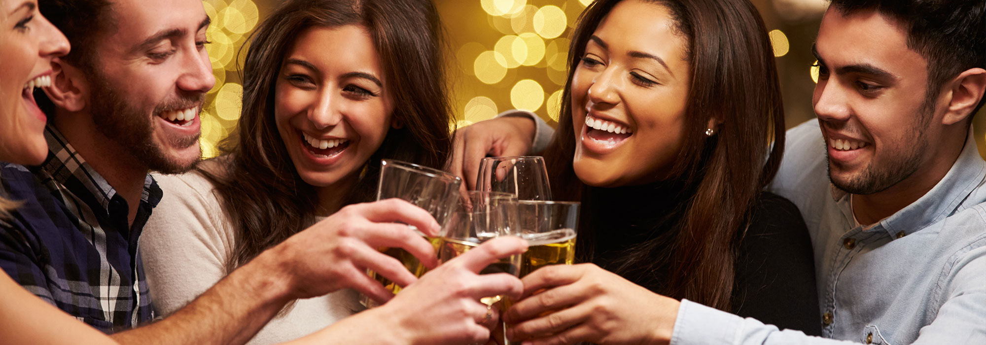 Group clinking glasses - "Cheers!"