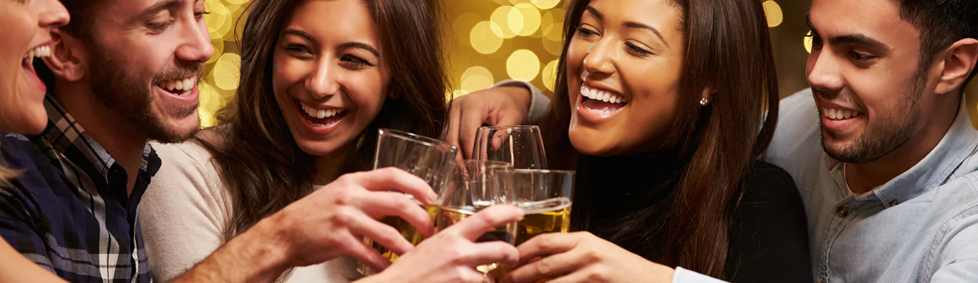 Group clinking glasses - "Cheers!"