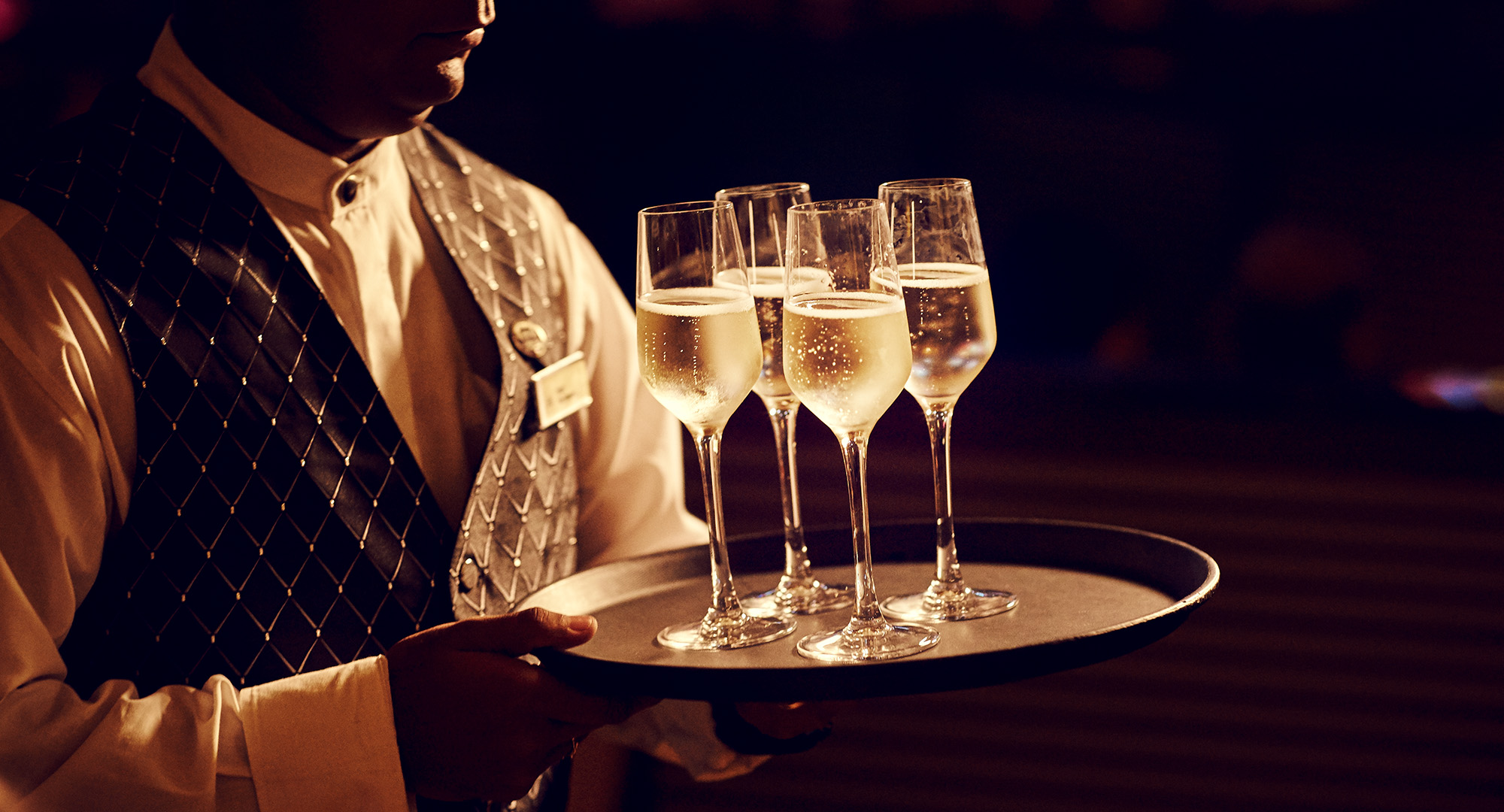 Waiter bringing drinks