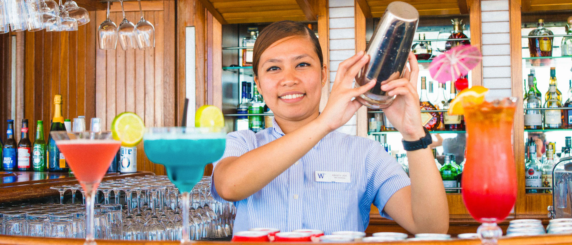 Waiter making cocktails