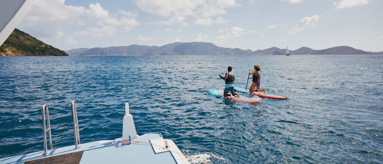 Paddleboarding off the watersports platform