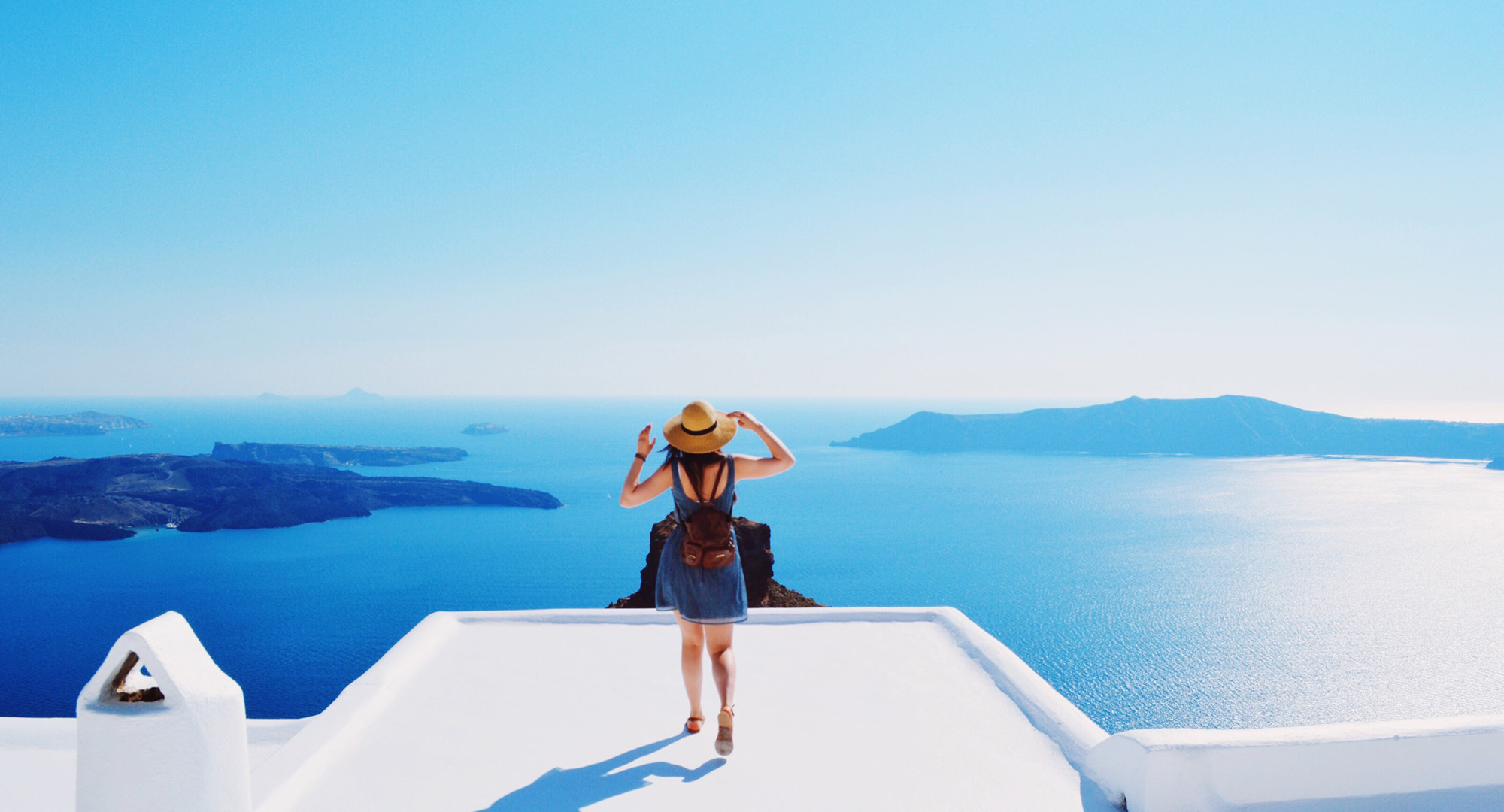 Lady looking out to sea at Oia, Santorini