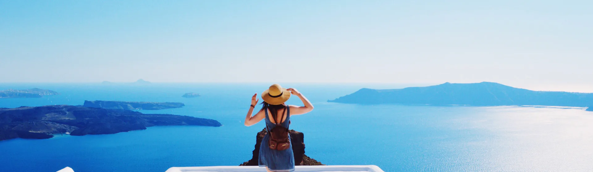 Lady looking out to sea at Oia, Santorini