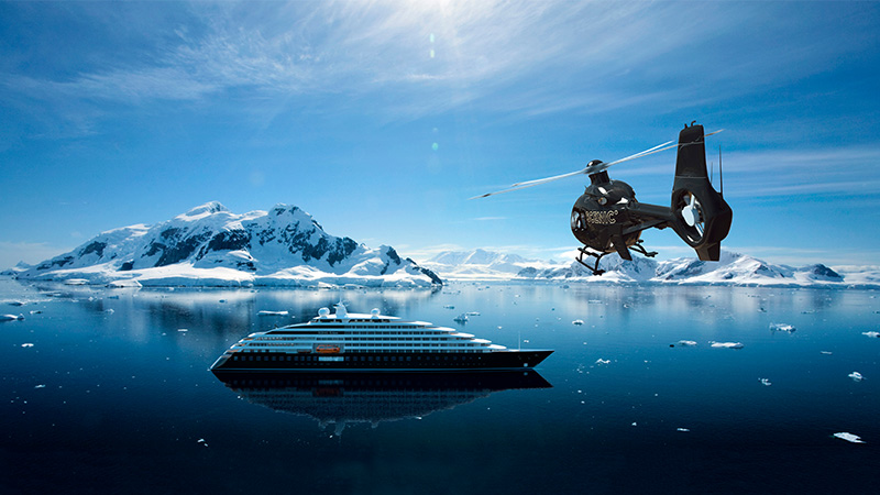 Scenic Eclipse and helicopter in Antarctica