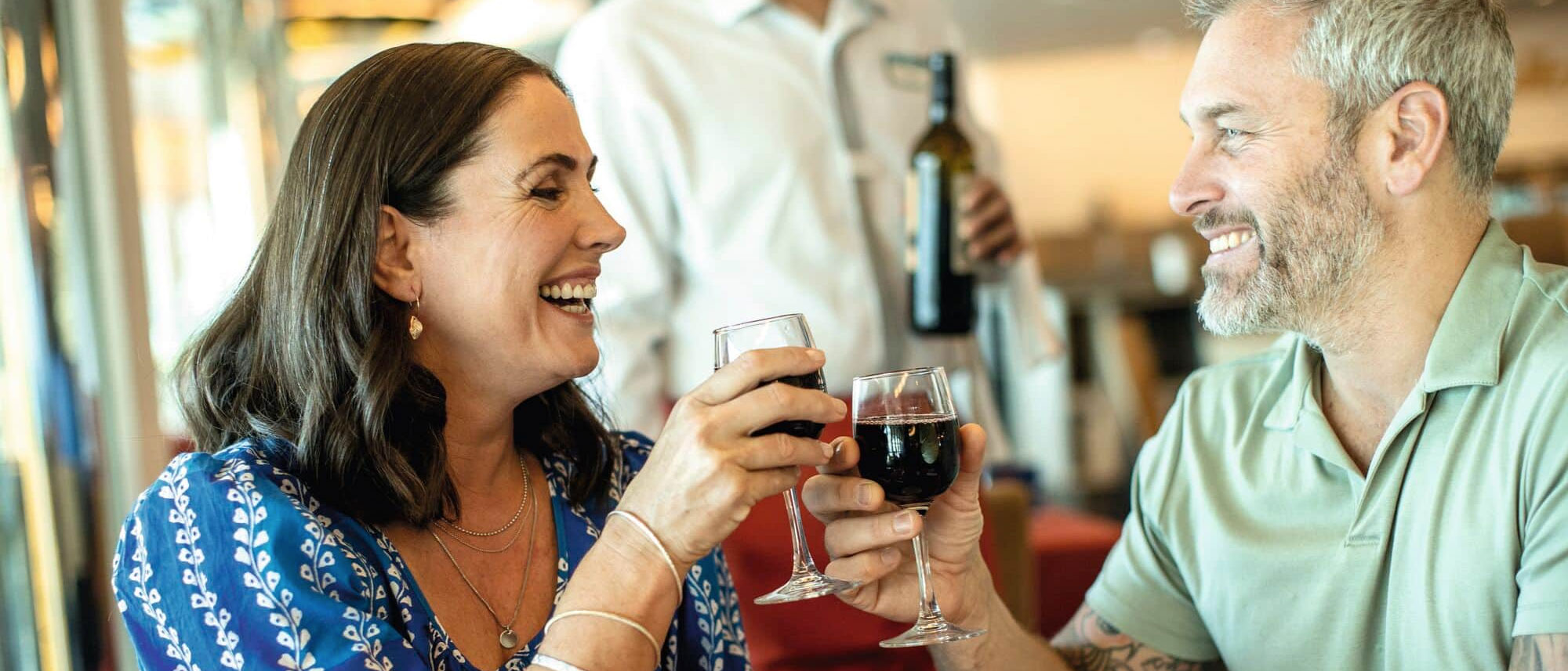 Couple with drinks onboard a Marella Cruise