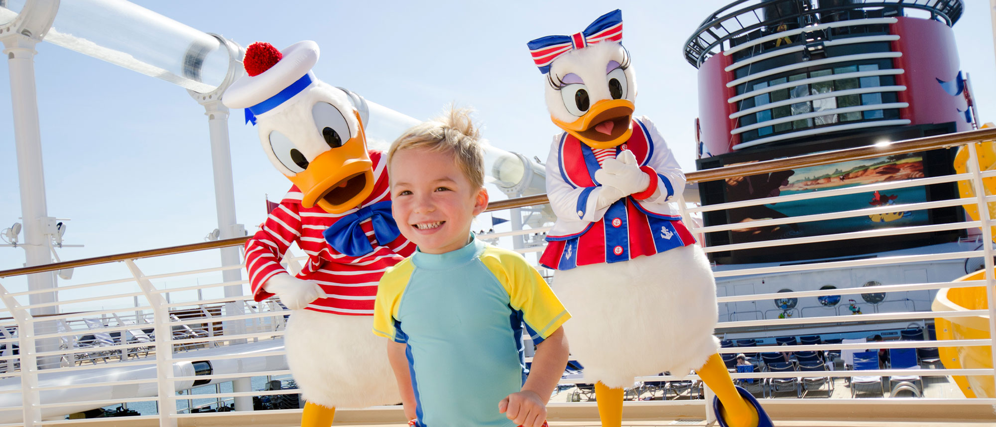 Donald and Daisy duck with child on deck