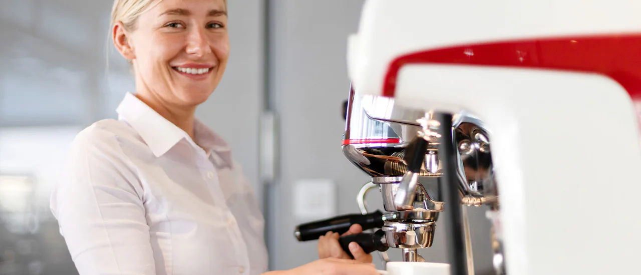 Waitress serving fresh coffee at the Aqua Pool Cafe