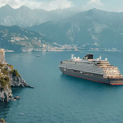 Explora Journeys ship sailing past the Amalfi Coast