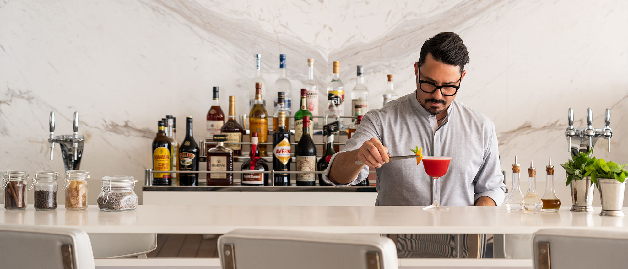Bartender making cocktails at the Mistral Bar