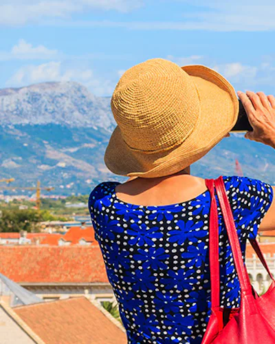 Tourists looking out over town in Croatia