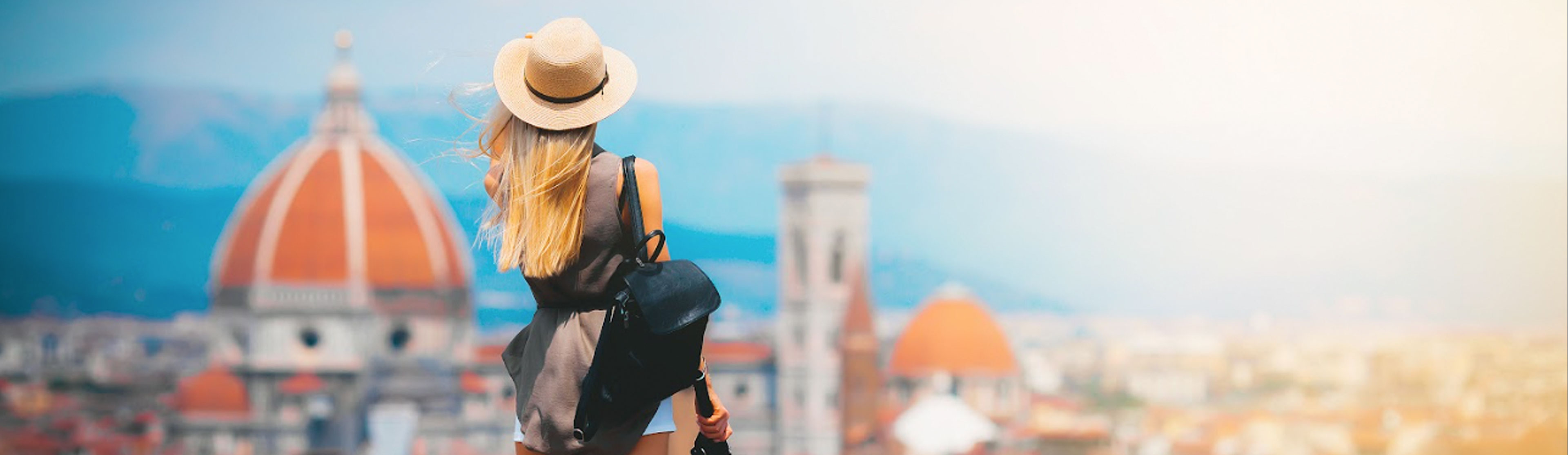 Lady looking across rooftops in Florence