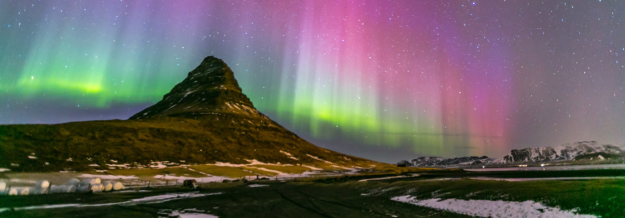 The Northern Lights above Kirkjufell in Iceland