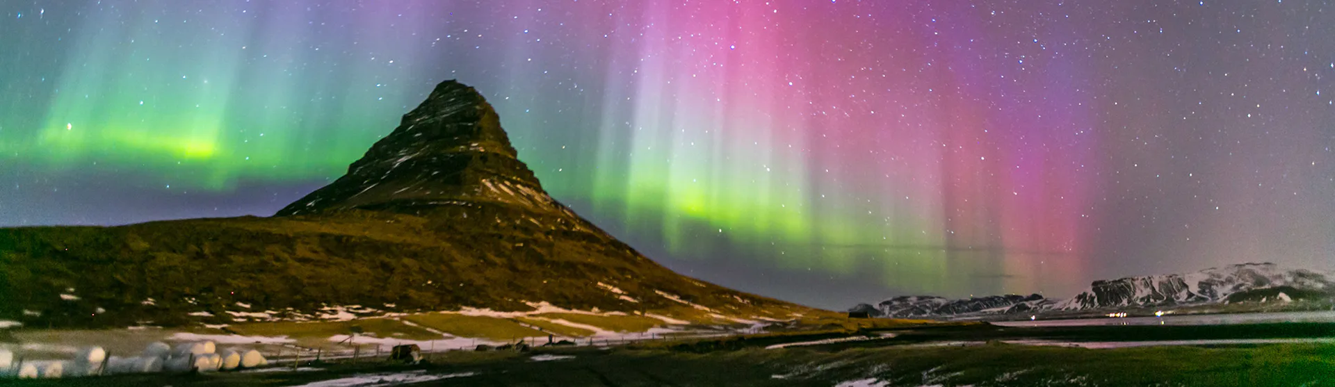 The Northern Lights above Kirkjufell in Iceland