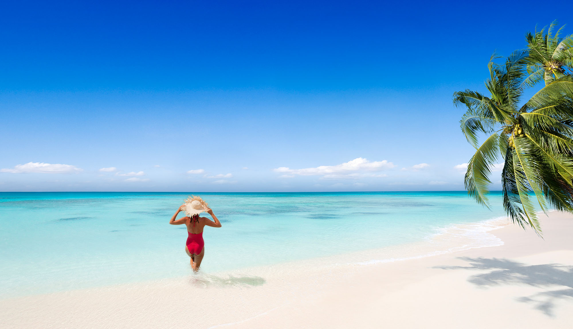 Caribbean beach lady in sea