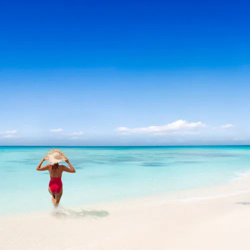 Caribbean beach lady in sea