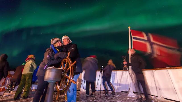 Experiencing the Northern Lights from the deck of a Hurtigruten ship