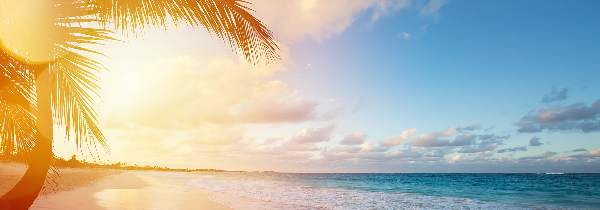 A Caribbean beach at sunset