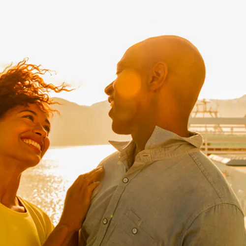 Couple enjoying the sunset on a P&O Cruises ship