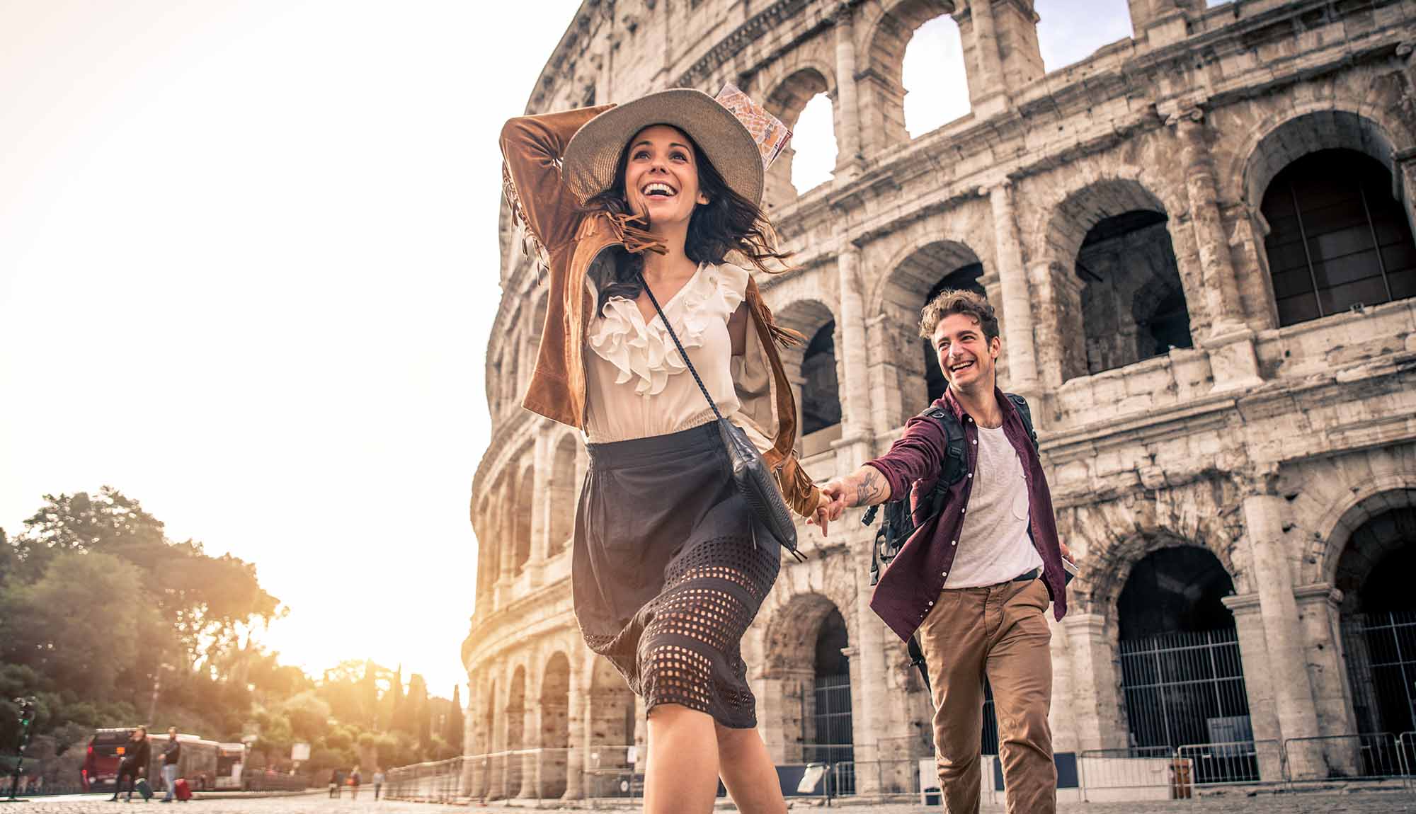 Couple enjoying time in Rome at the Colosseum