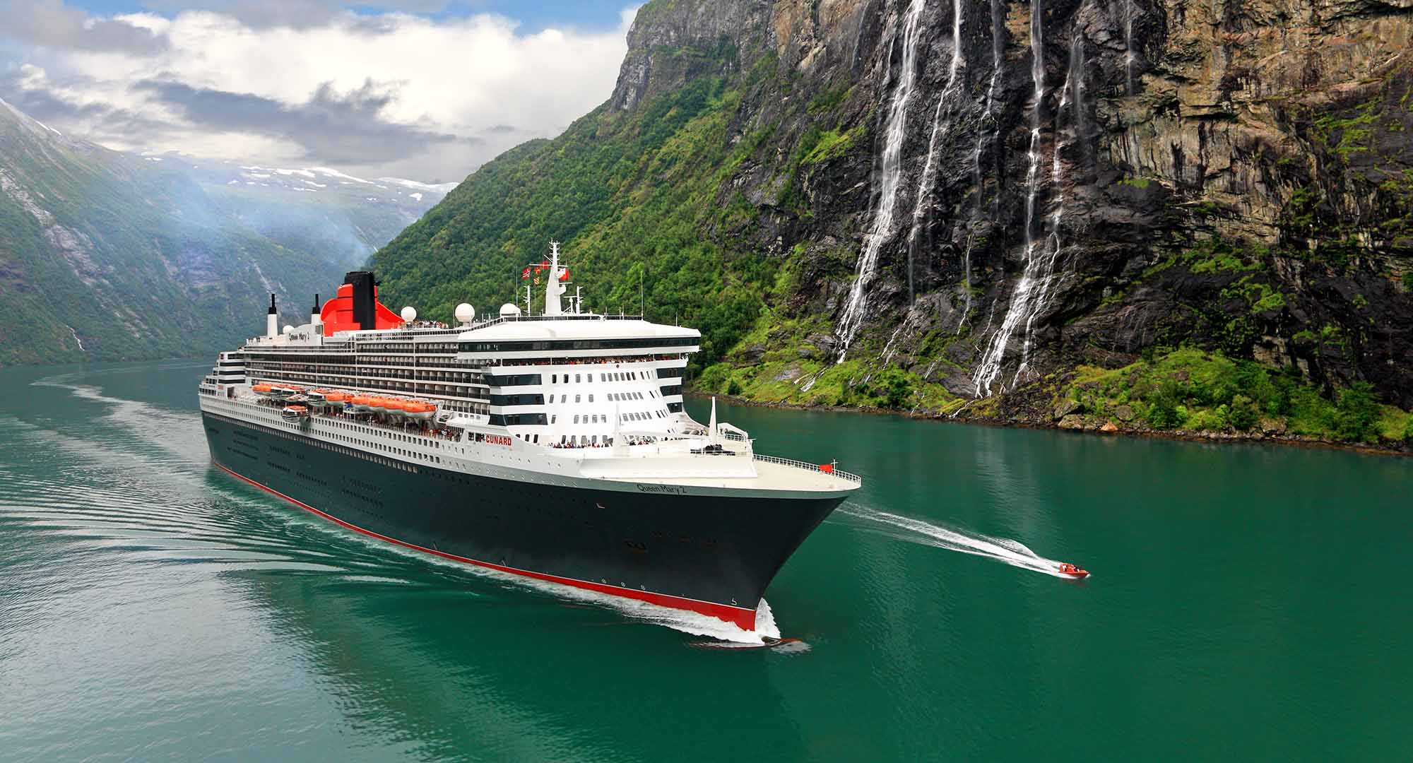 Cunard Queen sailing past Seven Sisters waterfall in Geirangerfjord