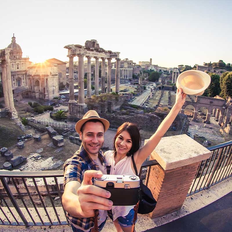 Couple taking a selfie outside the Roman Forum